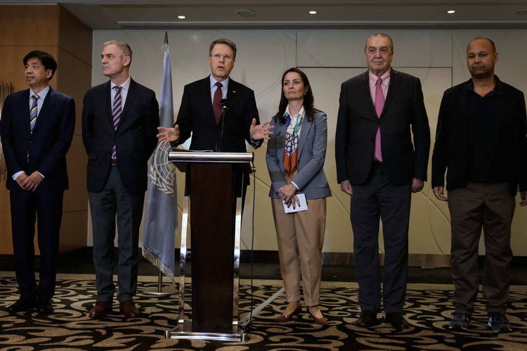Samuel Zbogar, third left, Slovenia's permanent representative to the United Nations and president of the Security Council, delivers a statement with his delegation in Beirut, Lebanon, Saturday, Dec. 6, 2025. (AP Photo/Bilal Hussein)