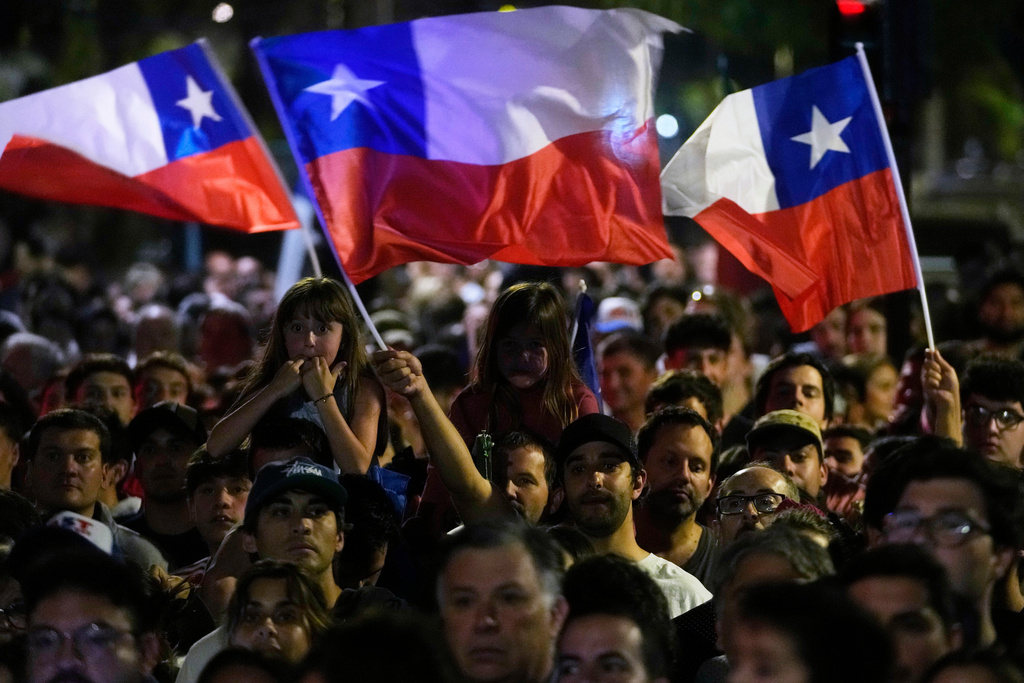 Supporters of presidential candidate Jose Antonio Kast of the Republican Party, gather to celebrate results in the general elections in Santiago, Chile, Sunday, Nov. 16, 2025. (AP Photo/Esteban Felix)