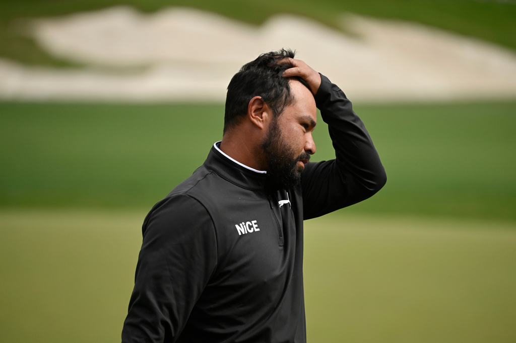 J.J. Spaun walks off of the 18th hole after the fourth round of the Valero Texas Open golf tournament in San Antonio, Sunday, April 5, 2026. (AP Photo/Darren Abate)