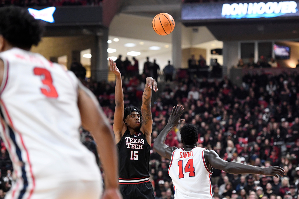 Texas Tech forward JT Toppin (15) shoots the ball during the first half in an NCAA college basketball game Houston, Saturday, Jan. 24, 2026, in Lubbock, Texas. (AP Photo/Annie Rice)