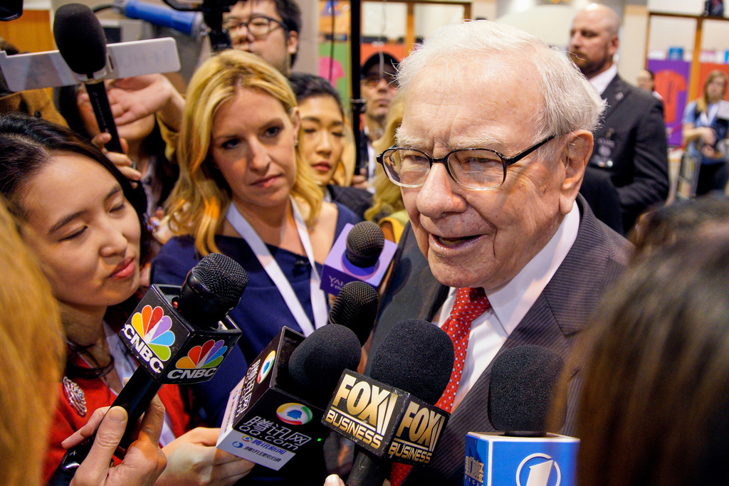 FILE - Warren Buffett, Chairman and CEO of Berkshire Hathaway, speaks to reporters before presiding over the annual shareholders meeting in Omaha, Neb., May 4, 2019. (AP Photo/Nati Harnik, File)