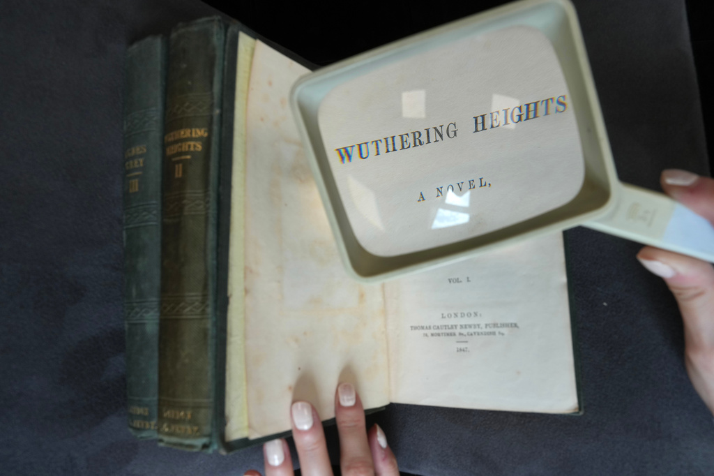 A first edition of Emily Bronte's Wuthering Heights, is on display for sale at Christie's auction house, with copies estimated at 400,000–600,000 GBP (540,000–810,000 USD) in London, Monday, June 15, 2026. (AP Photo/Kin Cheung)