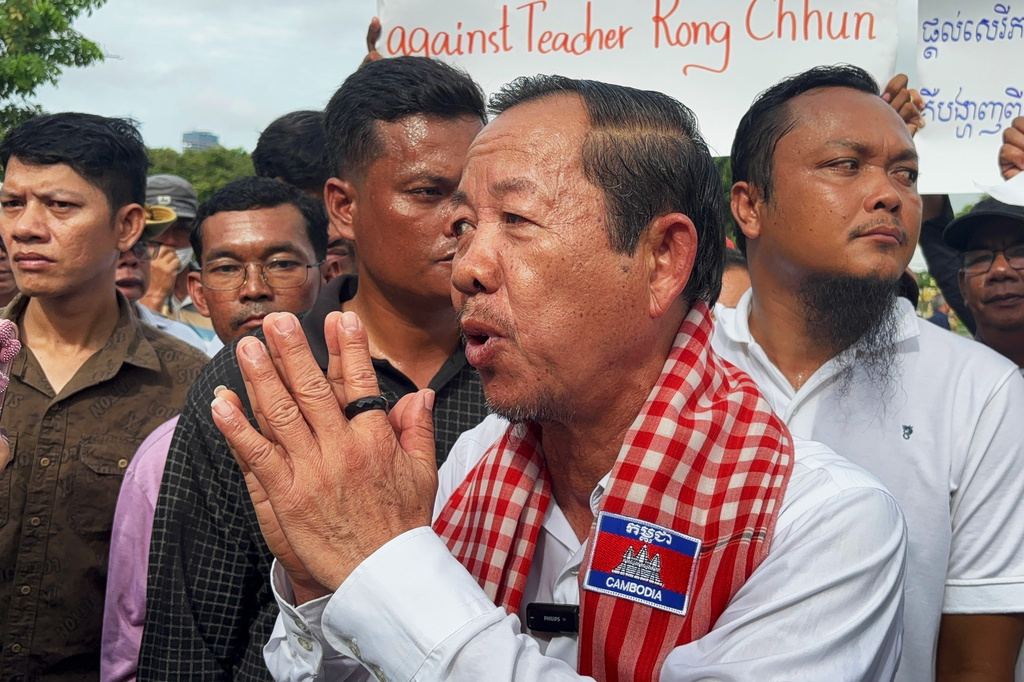 Rong Chhun, a top adviser to the Nation Power Party and a prominent opposition politician, reacts to supporters outside Cambodia's Supreme Court in Phnom Penh, Friday, June 19, 2026. (AP Photo/Sopheng Cheang)