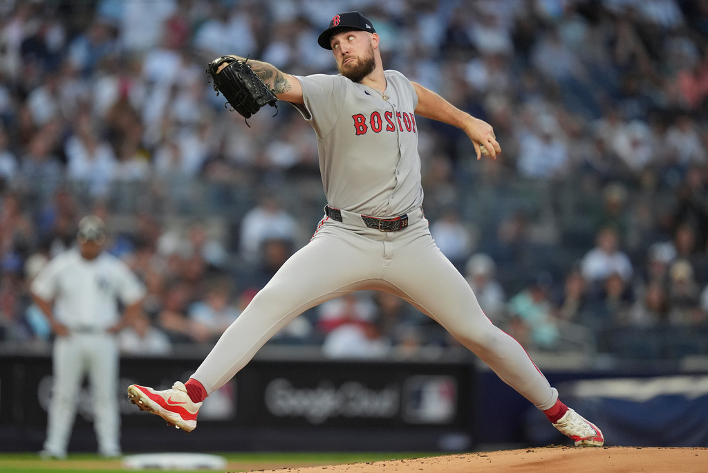Boston Red Sox pitcher Garrett Crochet delivers against the New York Yankees during the first inning of Game 1 of an American League wild-card baseball playoff series, Tuesday, Sept. 30, 2025, in New York. (AP Photo/Frank Franklin II)