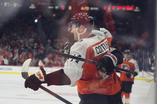 Philadelphia Flyers' Sean Couturier celebrates after scoring past Florida Panthers goaltender Daniil Tarasov during the second period of an NHL hockey game, Monday, Oct. 13, 2025, in Philadelphia. (AP Photo/Matt Rourke) Philadelphia Flyers' Sean Couturier celebrates after scoring past Florida Panthers goaltender Daniil Tarasov during the second period of an NHL hockey game, Monday, Oct. 13, 2025, in Philadelphia. (AP Photo/Matt Rourke)