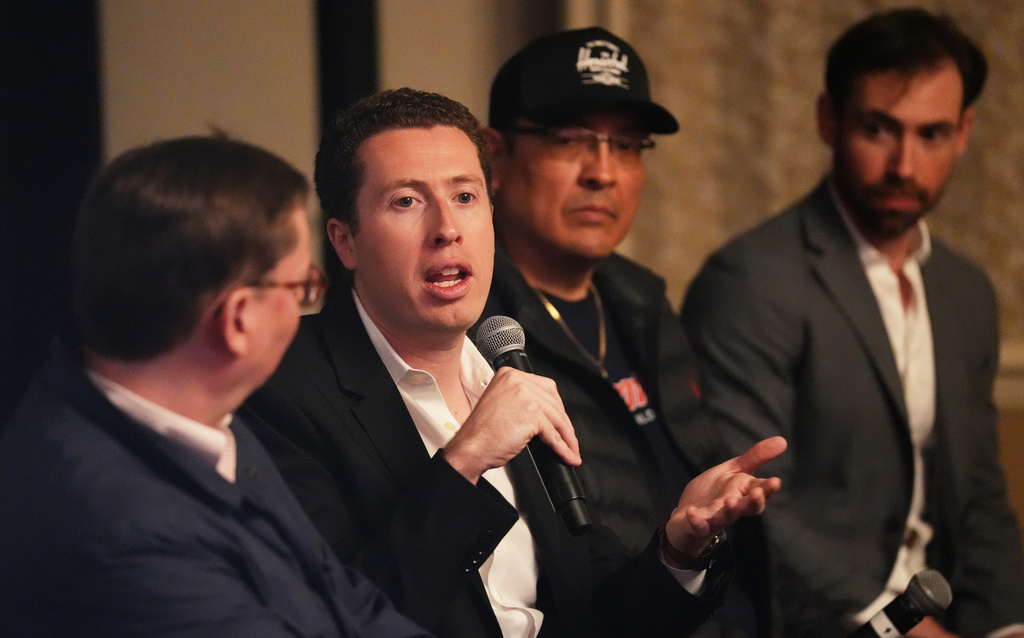 Coerte Voorhees, second from left, writer/director of the upcoming film "As Deep as the Grave," discusses the film with John Tsosie of Navajo Nation, second from right, and producer John Voorhees, far right, and moderator Brent Lang at CinemaCon 2026 on Wednesday, April 15, 2026, at Caesars Palace in Las Vegas. (AP Photo/Chris Pizzello)