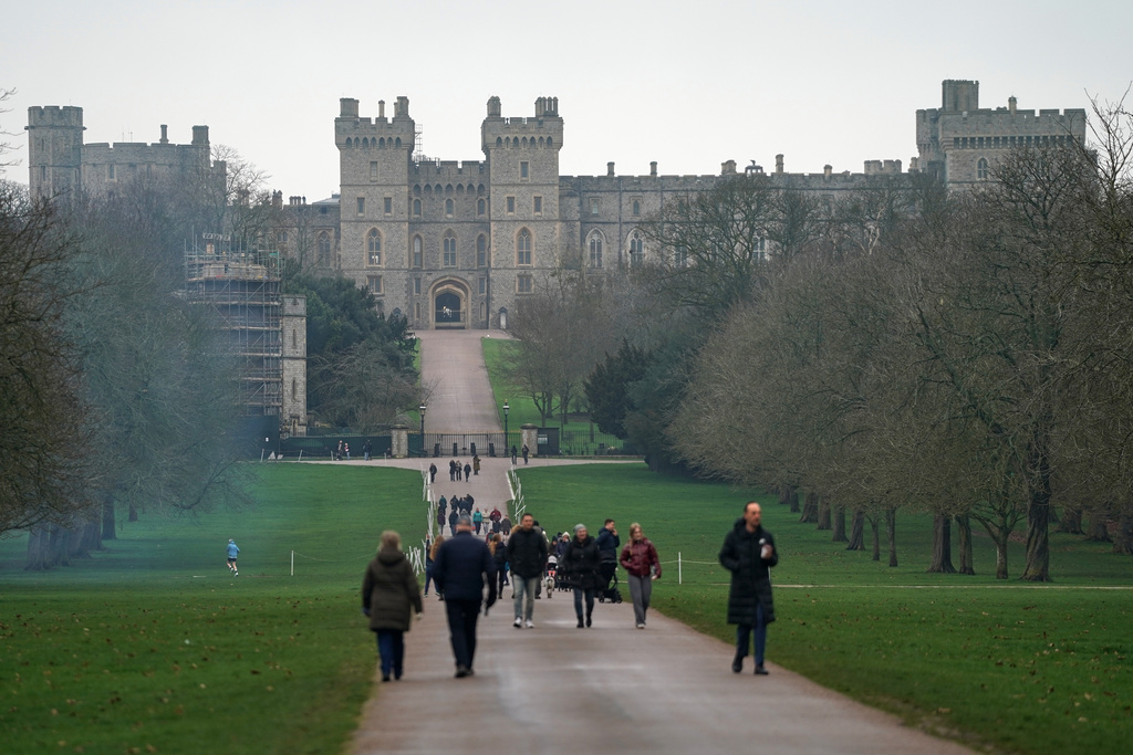 Visitors walk the long walk at Windsor Castle in Windsor, Thursday, Feb. 19, 2026 after Andrew Mountbatten-Windsor was arrested by British police on suspicion of misconduct in public office. (AP Photo/Alberto Pezzali)
