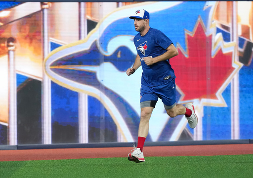 Toronto Blue Jays pitcher Max Scherzer warms up during practice ahead of game 6 of the World Series against the Los Angeles Dodgers in Toronto on Thursday, Oct. 30, 2025. (Nathan Denette/The Canadian Press via AP) Toronto Blue Jays pitcher Max Scherzer warms up during practice ahead of game 6 of the World Series against the Los Angeles Dodgers in Toronto on Thursday, Oct. 30, 2025. (Nathan Denette/The Canadian Press via AP)