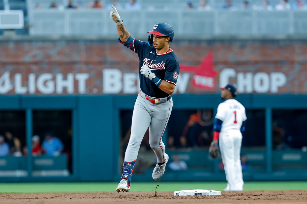 Washington Nationals' Daylen Lile reacts while rounding the bases after hitting a solo home run against the Atlanta Braves during the second inning of a baseball game, Thursday, July 30, 2026, in Atlanta. (AP Photo/Erik S. Lesser)