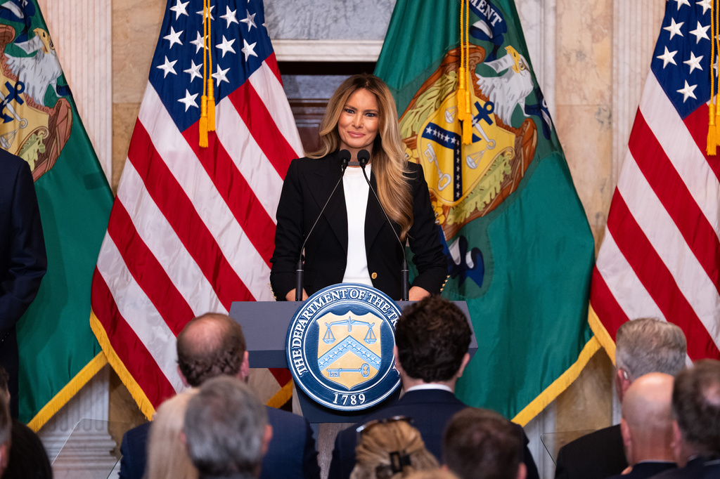 First lady Melania Trump speaks about Trump Accounts for children in foster care at the Department of Treasury, Thursday, June 11, 2026, in Washington. (AP Photo/Allison Robbert)