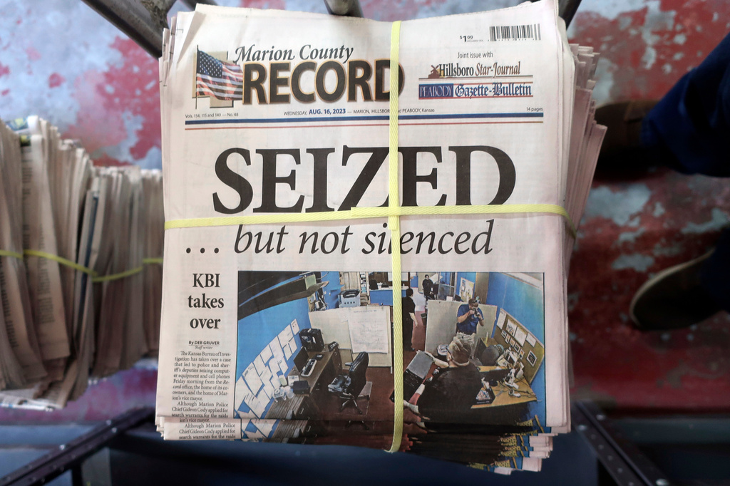 FILE - A stack of the Marion County Record sits in the back of the newspaper's building, awaiting unbundling, sorting and distribution, Aug. 16, 2023, in Marion, Kan. (AP Photo/John Hanna, File)