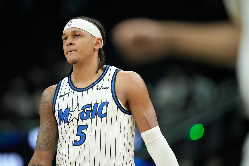 Orlando Magic's Paolo Banchero looks on during the first half of an NBA basketball game against the Milwaukee Bucks, Sunday, March 8, 2026, in Milwaukee. (AP Photo/Aaron Gash)