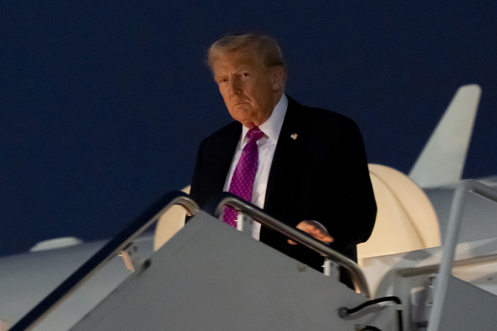 President Donald Trump arrives on Air Force One, Sunday, Sept. 14, 2025, at Joint Base Andrews, Md. (AP Photo/Alex Brandon)