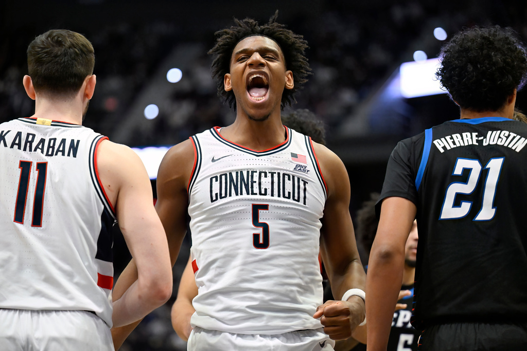 UConn forward Tarris Reed Jr. (5) reacts after being fouled in the first half of an NCAA college basketball game against DePaul Blue, Saturday, Jan. 10, 2026, in Hartford, Conn. (AP Photo/Jessica Hill)