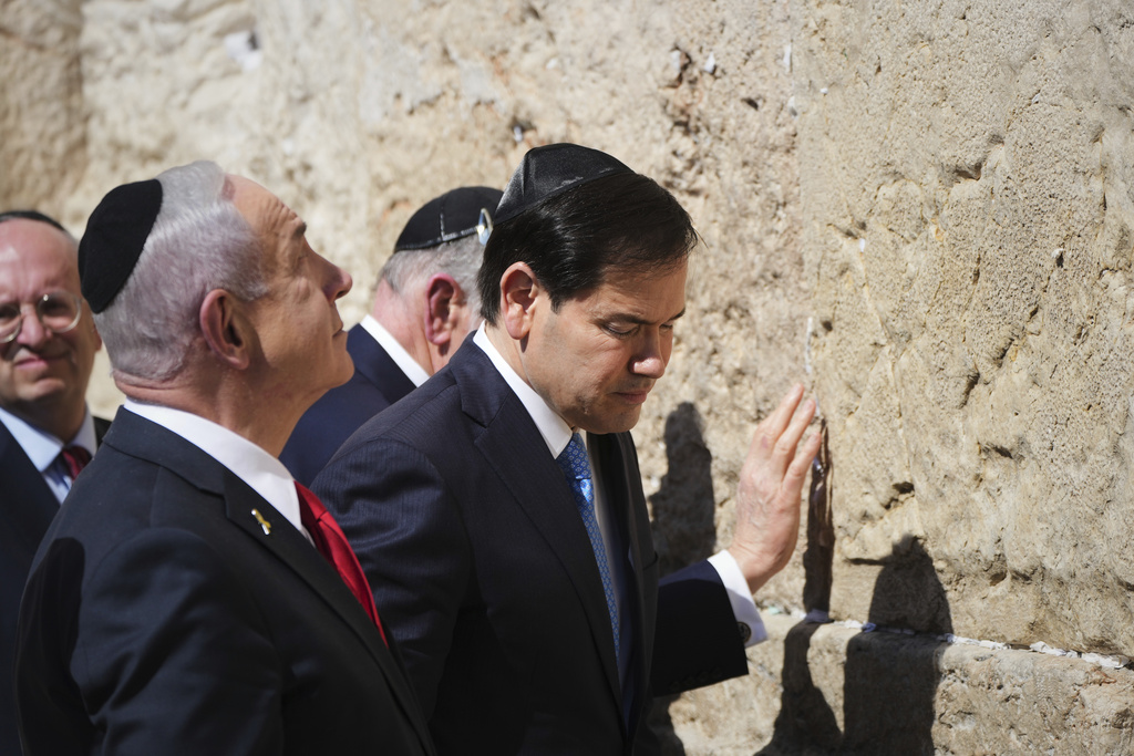 Israeli Prime Minister Benjamin Netanyahu, left, and U.S. Secretary of State Marco Rubio visit the Western Wall, the holiest site where Jews can pray, in the Old City of Jerusalem Sunday, Sept. 14, 2025. (AP Photo/Ariel Schalit)