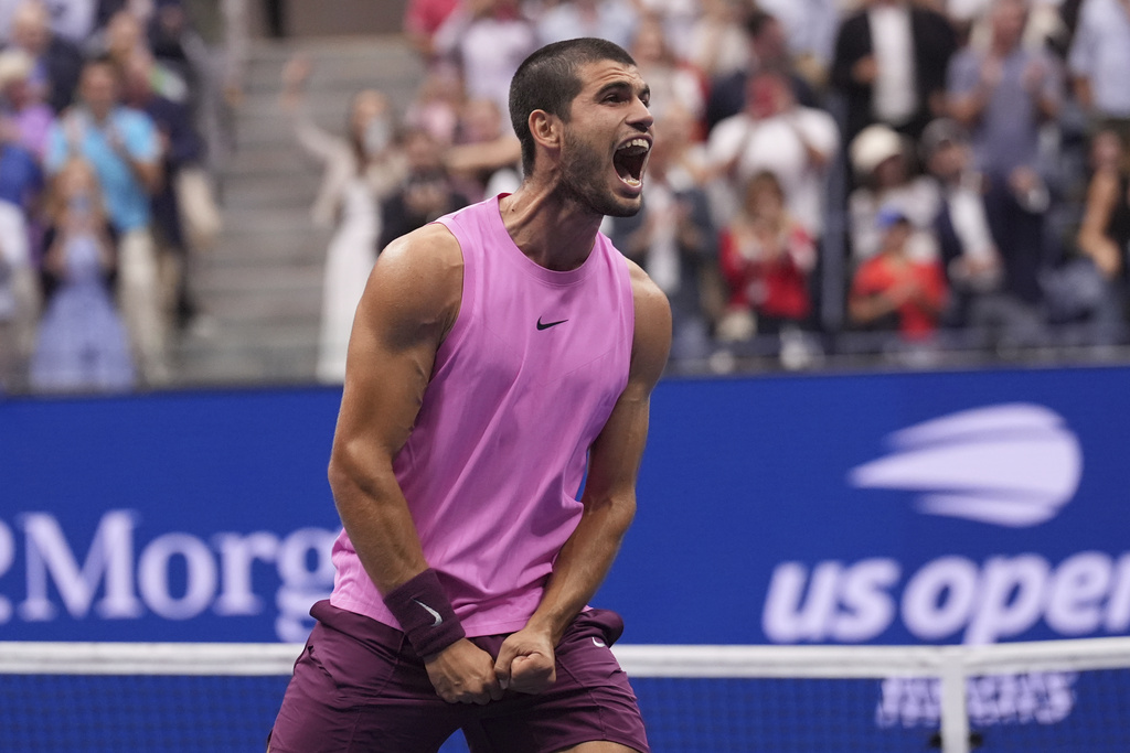 Carlos Alcaraz, of Spain, reacts after defeating Jannik Sinner, of Italy, to win the men's singles final of the U.S. Open tennis championships, Sunday, Sept. 7, 2025, in New York. (AP Photo/Frank Franklin II)