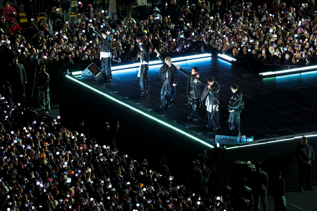 Kpop group BTS perform during 'BTS The Comeback Live Arirang' concert in central Seoul, South Korea, March 21, 2026. (Kim Hong-Ji/Pool Photo via AP)