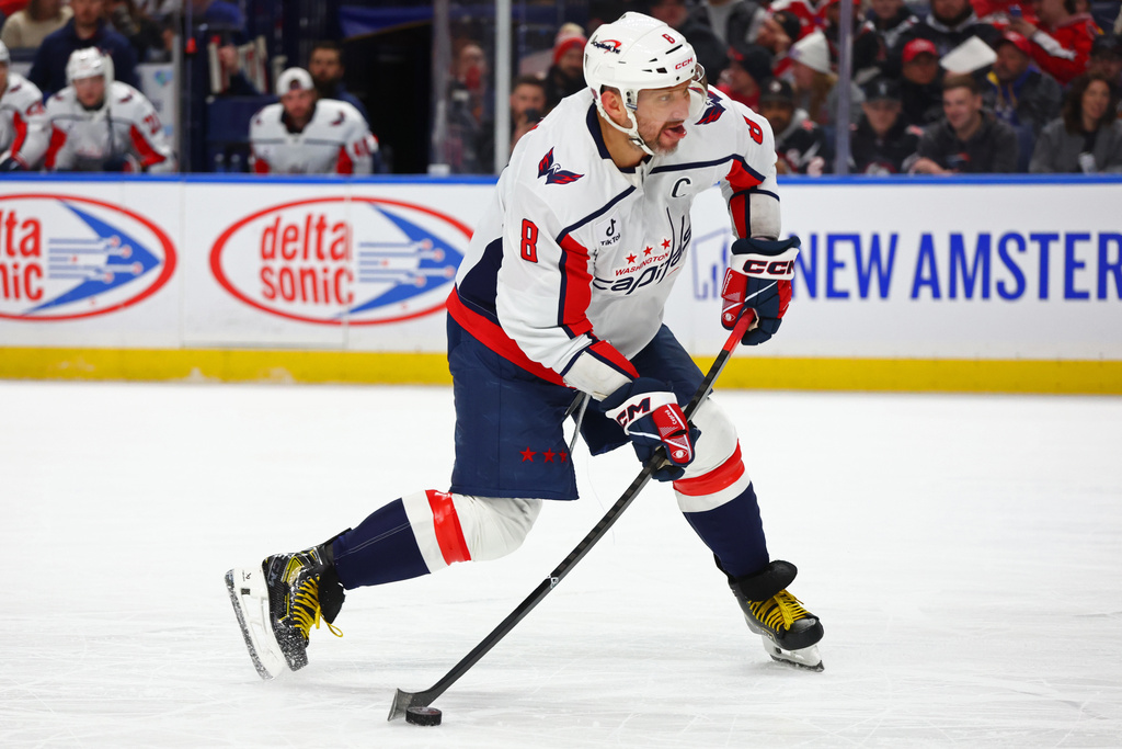 Washington Capitals left wing Alex Ovechkin takes a shot during the second period of an NHL hockey game against the Washington Capitals, Thursday, March 12, 2026, in Buffalo, N.Y. (AP Photo/Jeffrey T. Barnes)