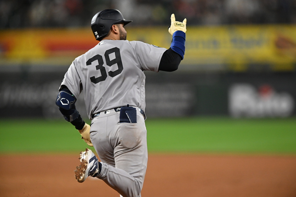 New York Yankees' Ali Sanchez celebrates after hitting a three-run home run during the eighth inning of a baseball game against the Chicago White Sox in Chicago, Monday, July 27, 2026. (AP Photo/Paul Beaty)