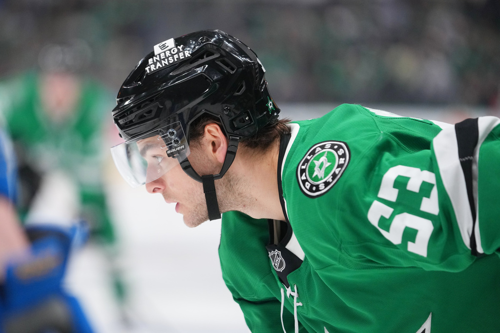 Dallas Stars center Wyatt Johnston waits fo the puck to drop against the St. Louis Blues during the first period of an NHL hockey game Friday, Jan. 23, 2026, in Dallas. (AP Photo/Julio Cortez)