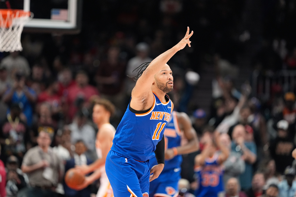 New York Knicks guard Jalen Brunson (11) celebrates after scoring in the first half during Game 6 in a first-round NBA basketball playoffs series against the Atlanta Hawks Thursday, April 30, 2026, in Atlanta. (AP Photo/Brynn Anderson)