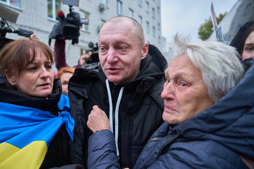 A mother holds her son soldier as he returns from Russian captivity during a POW exchange between Russia and Ukraine in Chernyhiv region, Ukraine, Thursday, Oct, 2025. (AP Photo/Efrem Lukatsky) A mother holds her son soldier as he returns from Russian captivity during a POW exchange between Russia and Ukraine in Chernyhiv region, Ukraine, Thursday, Oct, 2025. (AP Photo/Efrem Lukatsky)