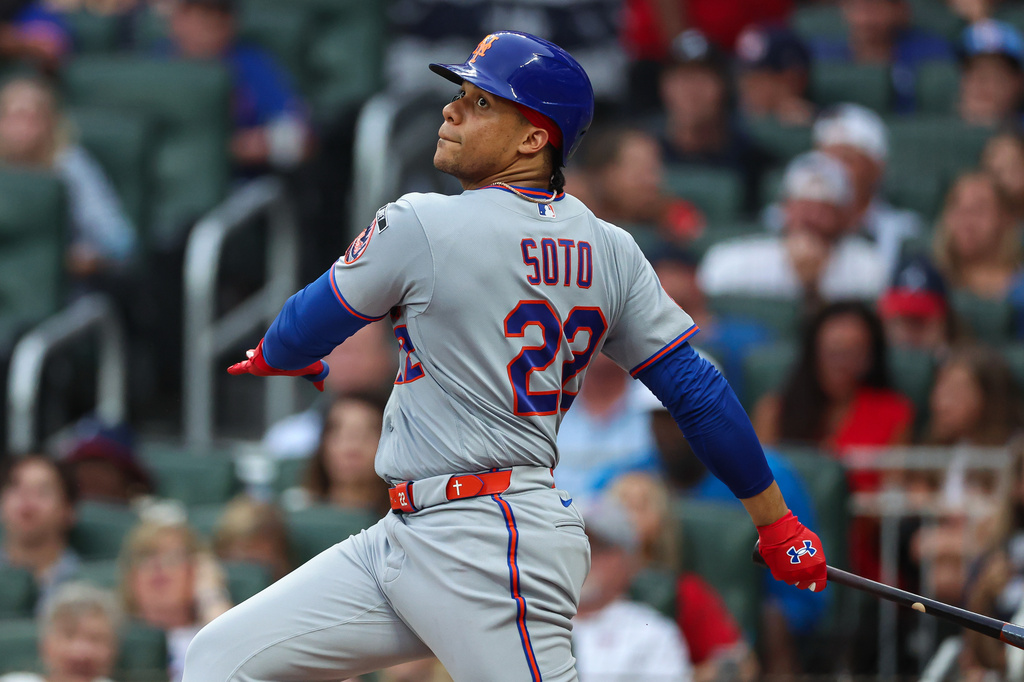 New York Mets' Juan Soto watches his tying two-run home run in the third inning of a baseball game against the Atlanta Braves, Friday, July 3, 2026, in Atlanta. (AP Photo/Colin Hubbard)