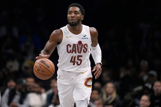 Cleveland Cavaliers' Donovan Mitchell (45) looks to pass during the first half of an NBA basketball game against the Brooklyn Nets Friday, Oct. 24, 2025, at Barclays Center in New York. (AP Photo/Frank Franklin II) Cleveland Cavaliers' Donovan Mitchell (45) looks to pass during the first half of an NBA basketball game against the Brooklyn Nets Friday, Oct. 24, 2025, at Barclays Center in New York. (AP Photo/Frank Franklin II)