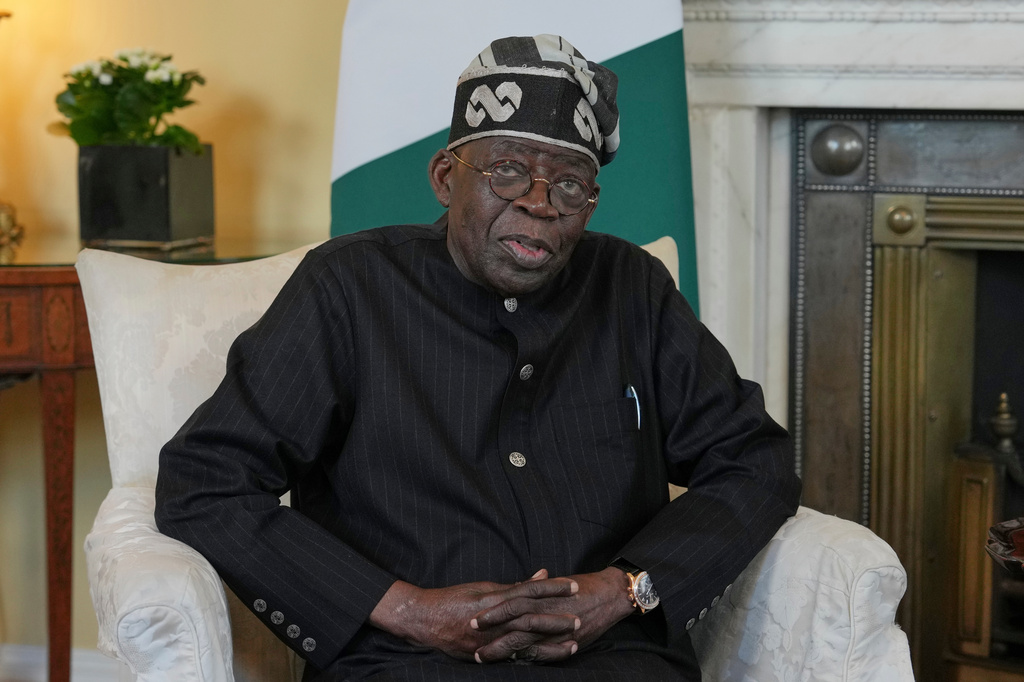FILE - President of Nigeria Bola Ahmed Tinubu speaks to the media ahead of his meeting with Britain's Prime Minister Keir Starmer inside 10 Downing Street in London, Thursday, March 19, 2026. (AP Photo/Kin Cheung, Pool File)