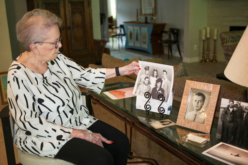 June West Brandt, 93, looks at a photo displaying her brother, William Durham West Jr., who was killed in World War II, Aug. 27, 2025, in Richmond, Texas. (AP Photo/Lekan Oyekanmi) June West Brandt, 93, looks at a photo displaying her brother, William Durham West Jr., who was killed in World War II, Aug. 27, 2025, in Richmond, Texas. (AP Photo/Lekan Oyekanmi)