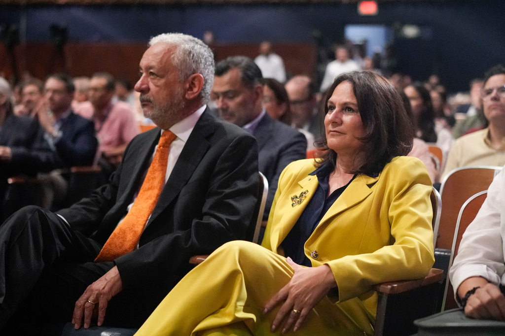Panama Canal Administrator Ricaurte Vasquez, left, and Deputy Administrator Ilya Espino de Marotta attend a water rights event focused on the Rio Indigo Lake project in Panama City, Thursday, May 21, 2026. (AP Photo/Matias Delacroix)
