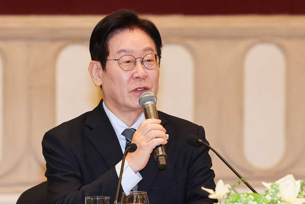 South Korean President Lee Jae Myung speaks during a meeting with members of South Korean media in Shanghai, China, Wednesday, Jan. 7, 2026. (Han Sang-kyun/Yonhap via AP)