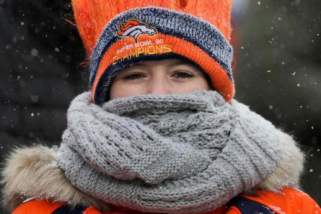 A Denver Broncos fan watches during the second half of the AFC Championship NFL football game against the New England Patriots, Sunday, Jan. 25, 2026, in Denver. (AP Photo/Ashley Landis)