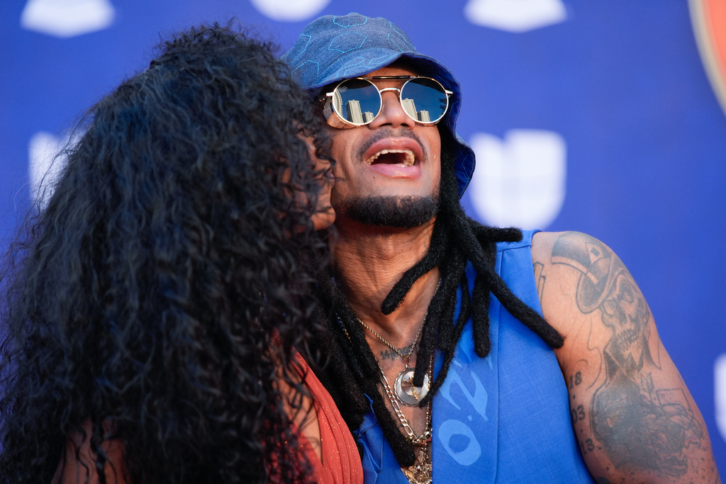 Yannely, left, and Vakero arrive at the 2025 Latin Grammys on Thursday, Nov. 13, 2025, at MGM Grand in Las Vegas. (AP Photo/John Locher)
