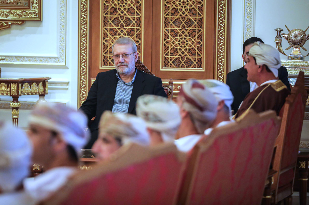 In this photo released by Iran's Supreme National Security Council office, Secretary of the Supreme National Security Council Ali Larijani attends a meeting in Muscat, Oman, Tuesday, Feb. 10, 2026. (Erfan Kouchari/Iran's Supreme National Security Council Office via AP)