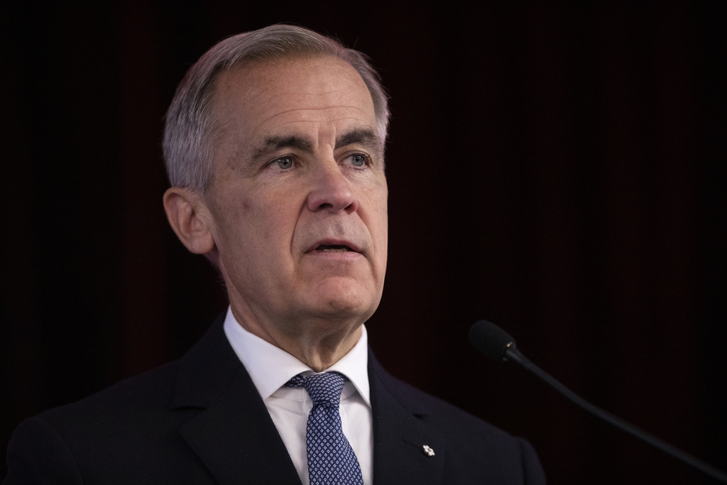 Prime Minister Mark Carney delivers opening remarks at the Liberal caucus in Edmonton on Wednesday Sept. 10, 2025. (Amber Bracken/The Canadian Press via AP)