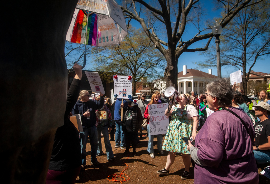 Demonstrators gather for the "No Kings" rally at Wilson Park in Florence, Ala, on Saturday, March 28, 2026. (Dan Busey/The TimesDaily via AP)