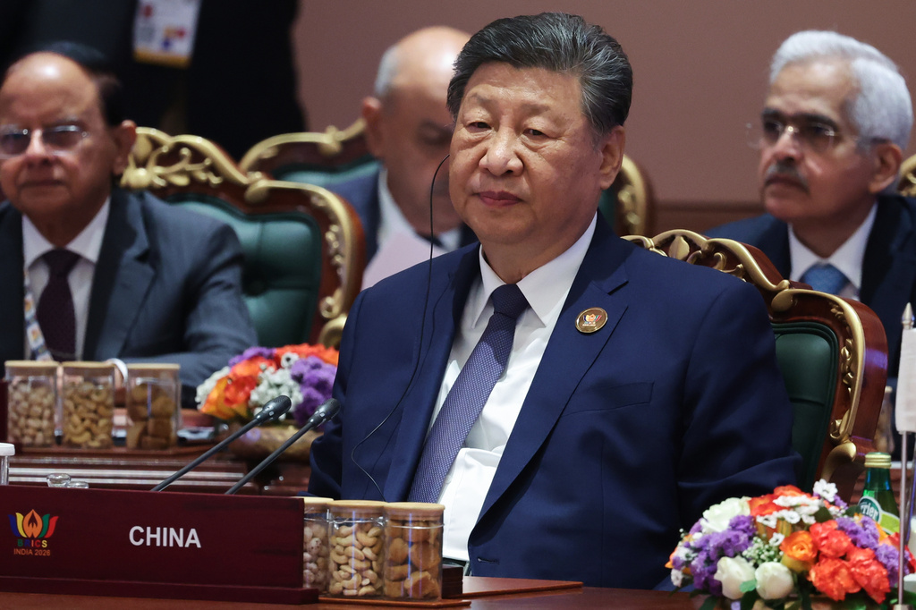 Chinese President Xi Jinping attends a session of the BRICS Plus Outreach format in New Delhi, India, on Sunday, Sept. 13, 2026. (Alexander Kazakov, Sputnik, Kremlin Pool Photo via AP)
