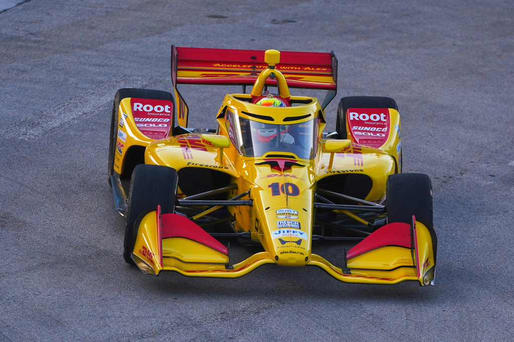 Diver Alex Palou takes a turn during practice for the IndyCar Grand Prix of Arlington auto race, Saturday, March 14, 2026, in Arlington, Texas. (AP Photo/LM Otero)