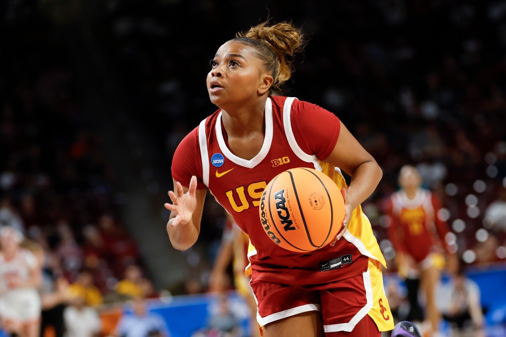 Southern California guard Londynn Jones drives to the basket against Clemson during the first half of the first round of the NCAA college basketball tournament, Saturday, March 21, 2026, in Columbia, S.C. (AP Photo/Nell Redmond)