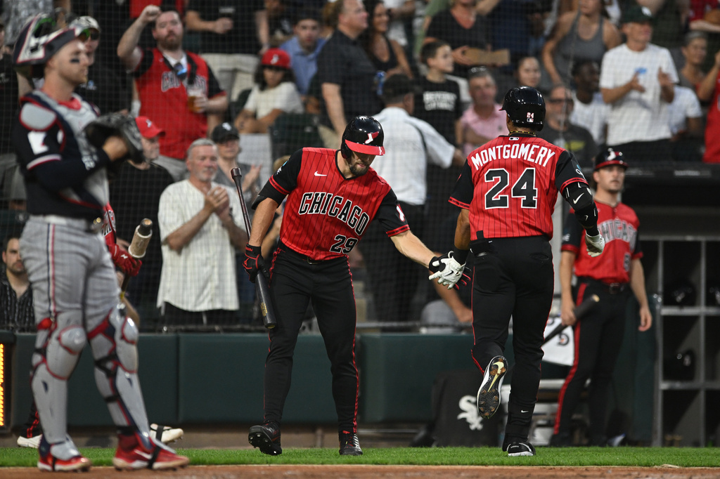 Chicago White Sox's Braden Montgomery (24) celebrates with teammate Tristan Peters (29) after hitting a solo home run during the second inning of a baseball game against the Minnesota Twins, Friday, Sept. 4, 2026, in Chicago. (AP Photo/Paul Beaty)