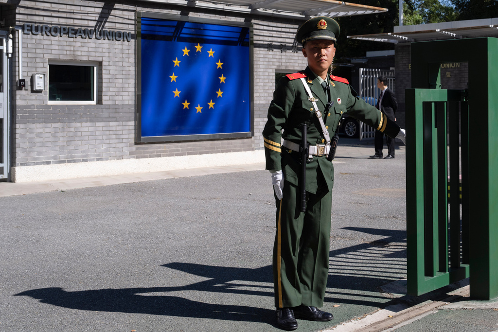 FILE - A Chinese paramilitary policeman stands guard at the entrance to the European Union Delegation to China compound in Beijing, China, on Oct. 14, 2023. (AP Photo/Ng Han Guan, File)