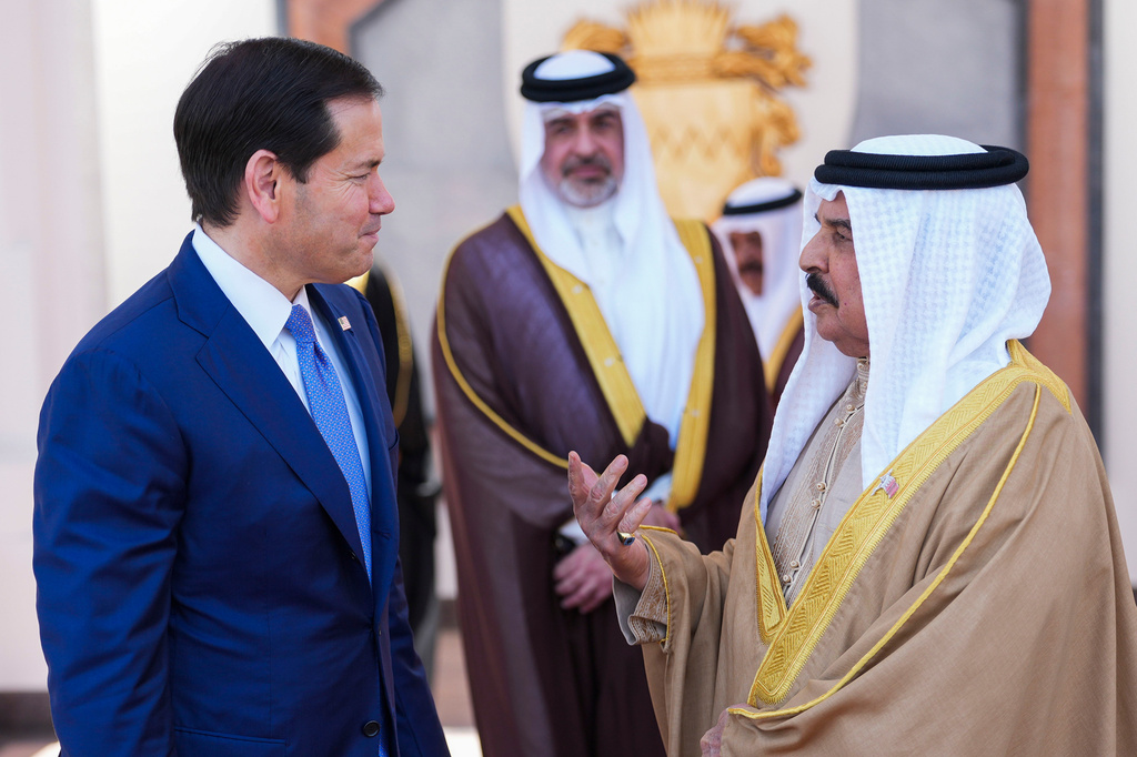 U.S. Secretary of State Marco Rubio, left, and Bahrain's King Hamad bin Isa Al Khalifa share a word after their meeting, at Al-Sakhir Palace near Zallaq, Bahrain Thursday, June 25, 2026. (Eric Lee/Pool Photo via AP)