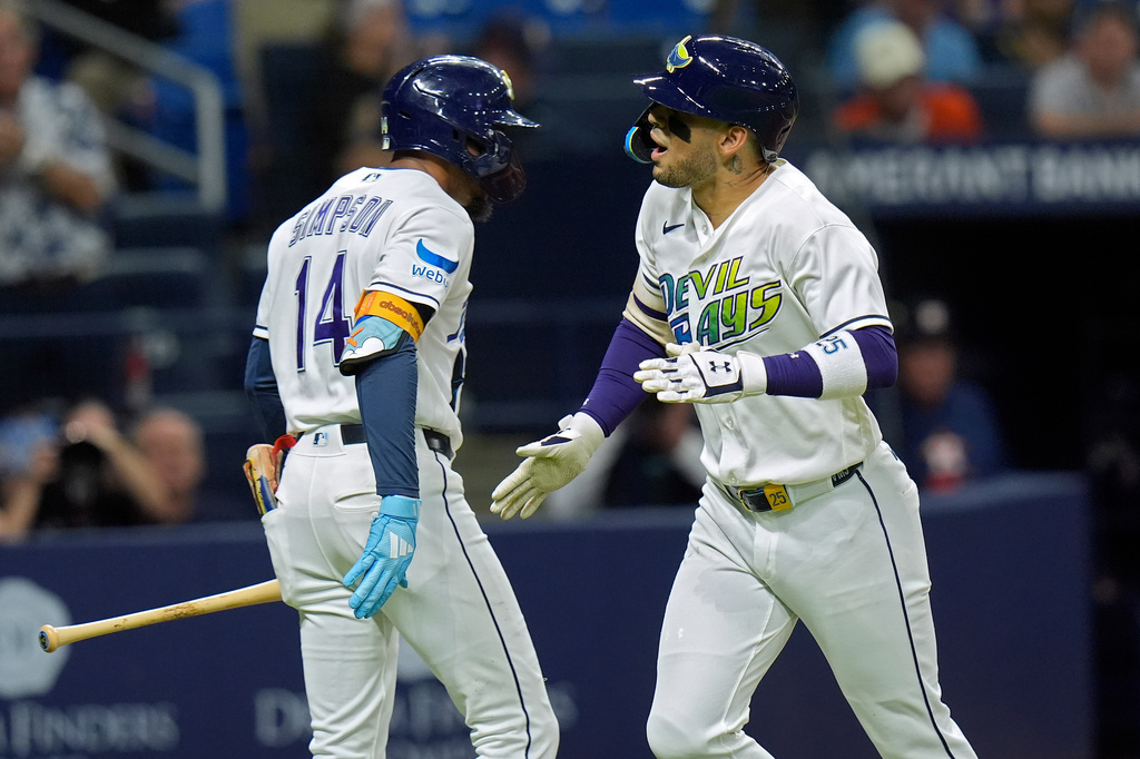 Tampa Bay Rays' Victor Mesa Jr. celebrates his solo home run off Houston Astros pitcher Ethan Pecko with Chandler Simpson (14) during the fifth inning of a baseball game Friday, Sept. 11, 2026, in St. Petersburg, Fla. (AP Photo/Chris O'Meara)