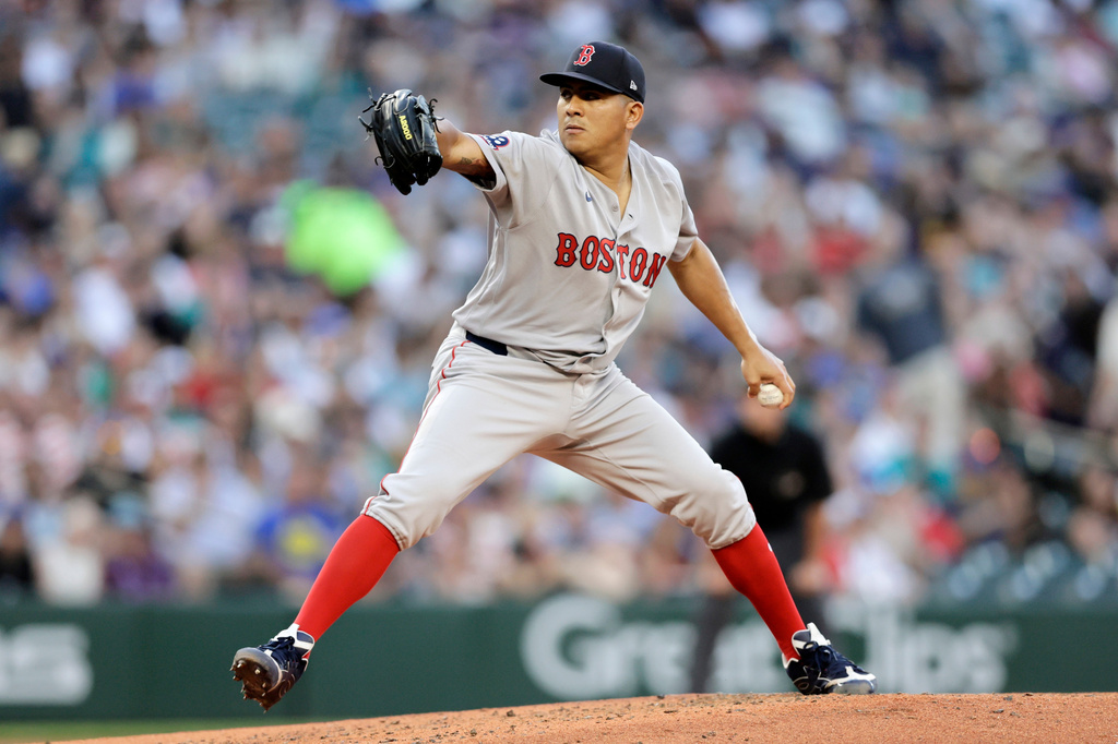 Boston Red Sox starting pitcher Ranger Suarez throws against the Seattle Mariners during the fifth inning of a baseball game, Friday, June 19, 2026, in Seattle. (AP Photo/John Froschauer)
