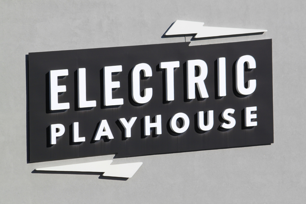 A large sign greets visitors at the first location of the Electric Playhouse in Albuquerque, N.M., Tuesday, Oct. 21, 2025. (AP Photo/Susan Montoya Bryan)