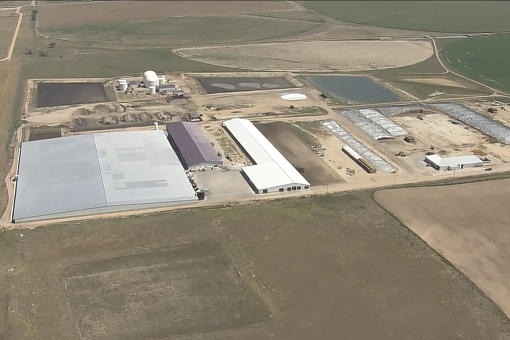 This image taken from video provided by DENVER7 shows a dairy in Keenesburg, Colo., on Thursday, Aug. 21, 2025, where authorities say six people died from an apparent accident involving exposure to gas. (DENVER7/KMGH via AP)