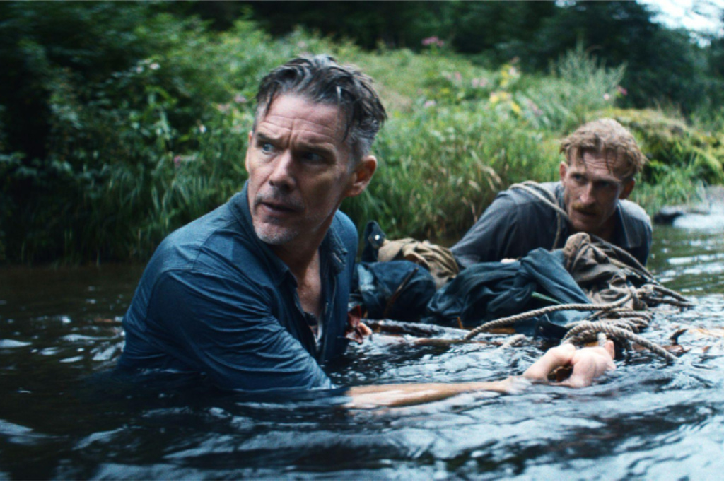This image released by Vertical shows Ethan Hawke, left, and Austin Amelio in a scene from "The Weight." (Vertical via AP)
