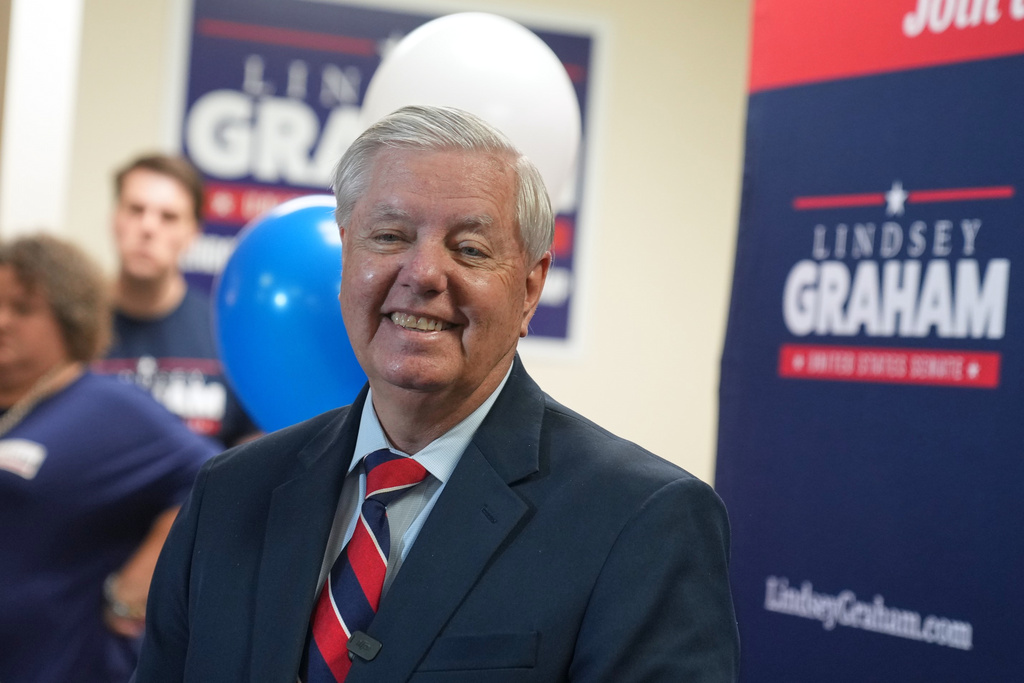 Sen. Lindsey Graham, R-S.C., speaks with supporters after filing his reelection paperwork Monday, March 16, 2026, in Columbia, S.C. (AP Photo/Meg Kinnard)
