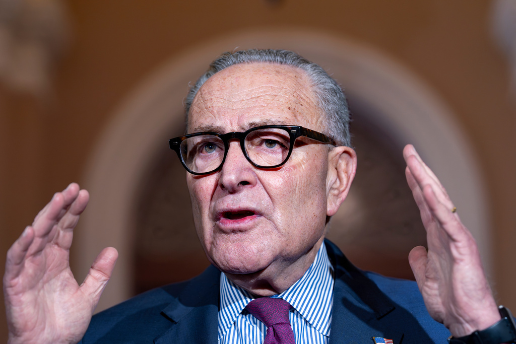 Senate Minority Leader Chuck Schumer, D-N.Y., expresses his frustration as he speaks to reporters outside the Senate chamber to blame President Donald Trump and the Republicans with the government shutdown, at the Capitol in Washington, Thursday, Oct. 16, 2025. (AP Photo/J. Scott Applewhite)